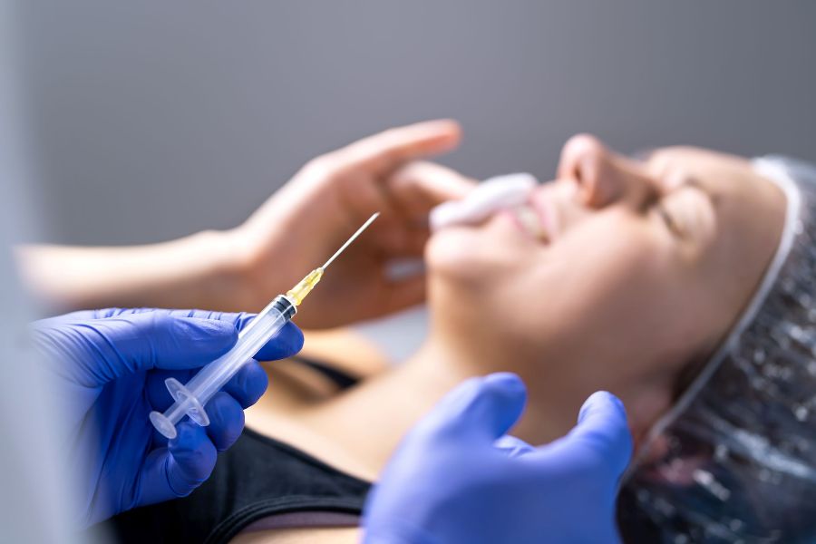 A woman undergoing a beauty treatment